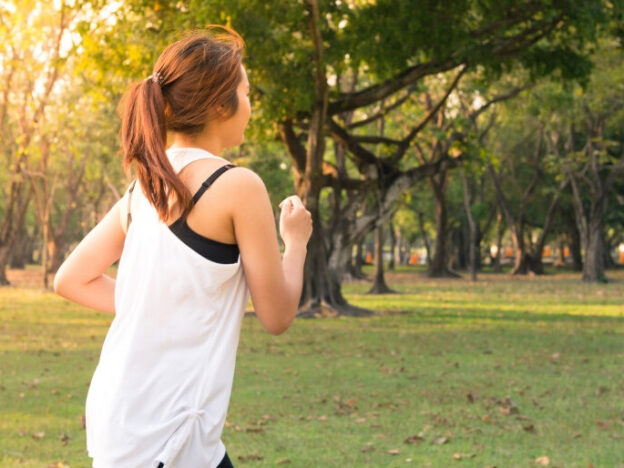 Woman running in park.