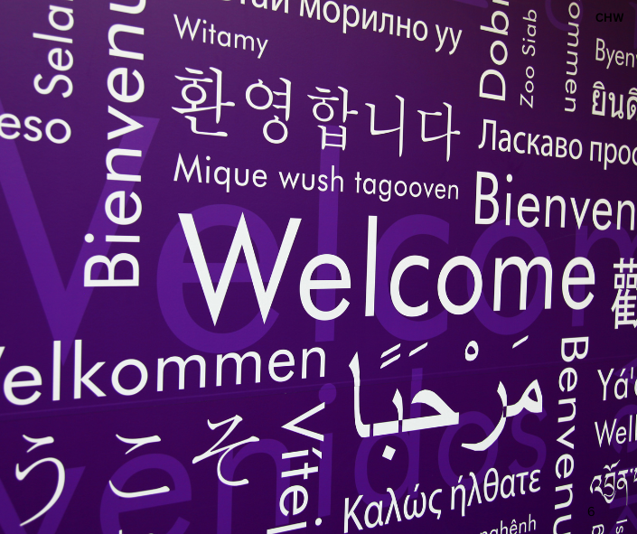 Language Course Pic 1 Purple background with the word Welcome in several languages.
