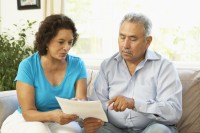 navigator helping an hispanic man